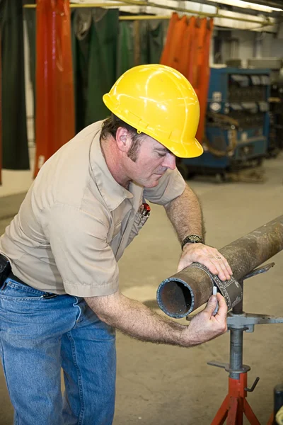 Metal Worker Measures Pipe — Stock Photo, Image
