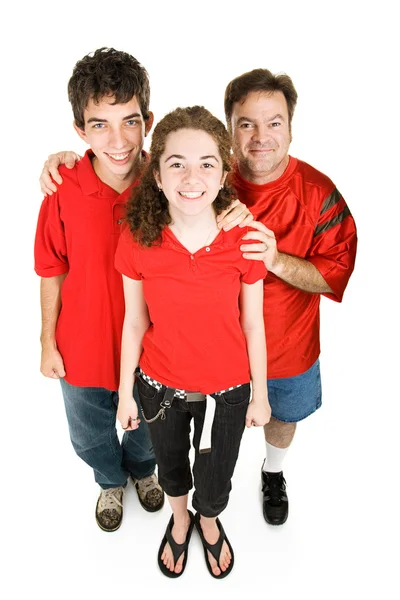 Tieners en vader in het rood — Stockfoto
