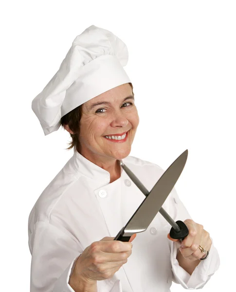 Chef feliz afiar faca — Fotografia de Stock