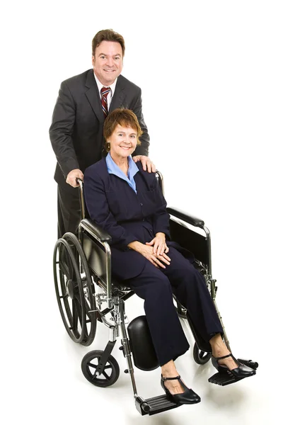 Femme d'affaires handicapée et collègue — Photo