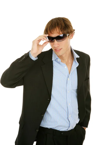 Jeune homme d'affaires enlève les lunettes de soleil — Photo