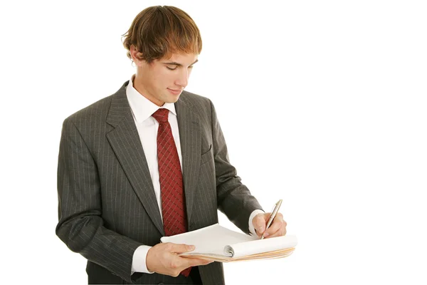 Νέος επιχειρηματίας κρατώντας σημειώσεις — Φωτογραφία Αρχείου