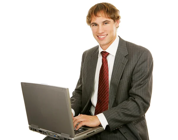 Giovane uomo d'affari con laptop — Foto Stock