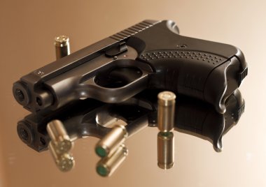 Pistol with cartridges 2 clipart