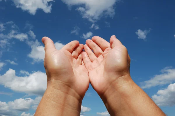 stock image Hands of young woman in prayer to heaven.