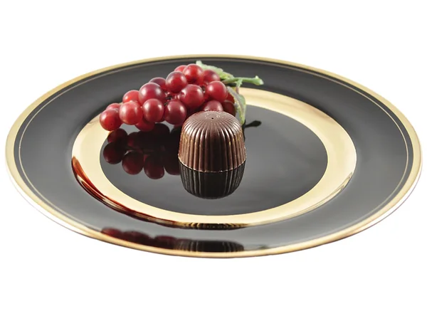 Čokoládové bonbóny na talíři — Stock fotografie