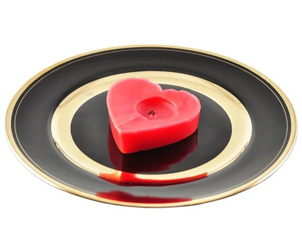 Candela di cuore su un piatto — Foto Stock