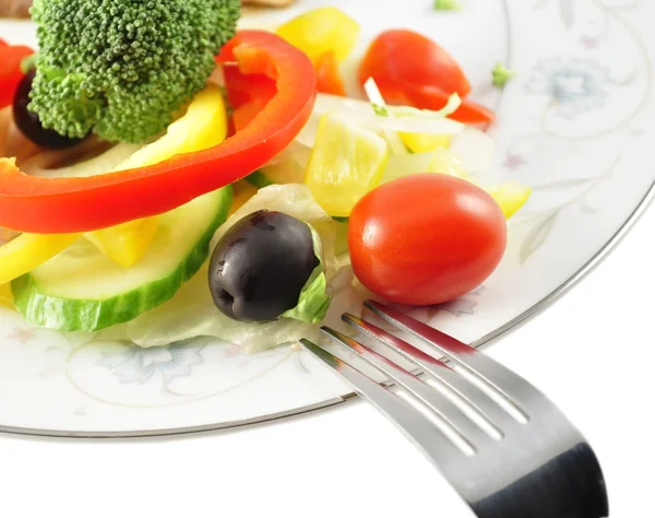 Salada e garfo — Fotografia de Stock