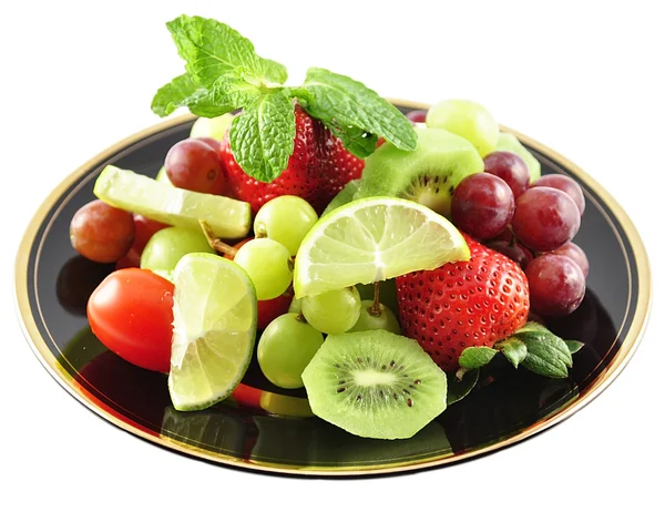 Buah-buahan di piring — Stok Foto