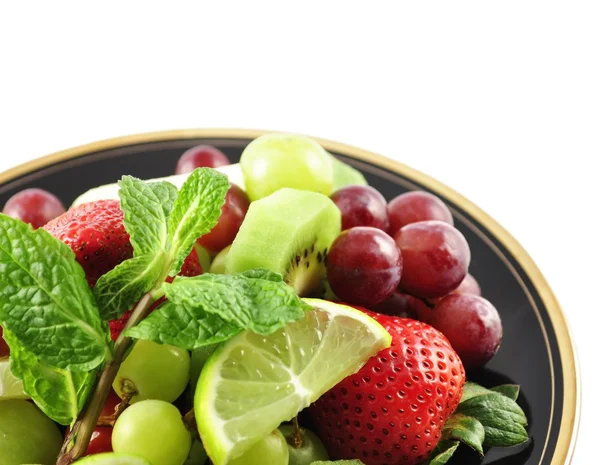 Früchte auf einem Teller — Stockfoto