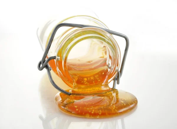 Miel en un frasco —  Fotos de Stock
