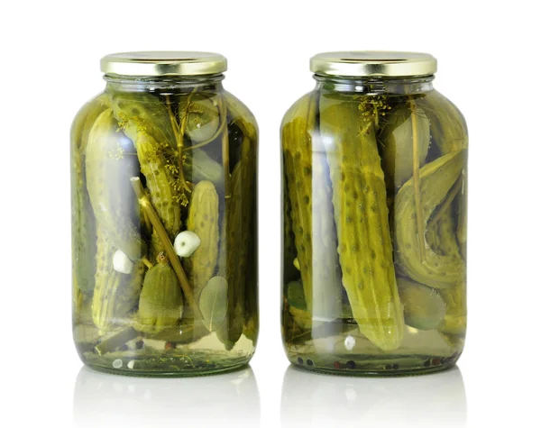 Glass jars with pickled cucumbers — Stock Photo, Image