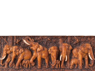 Elephants engrave on wood clipart