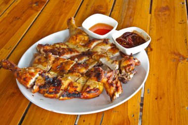 Grilled chicken on plate clipart