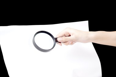 A magnifying glass hovering over as Inspection clipart