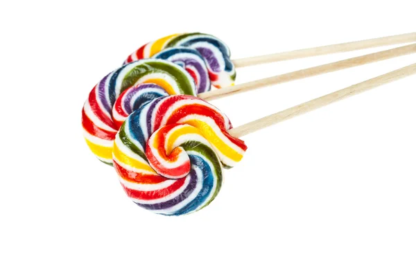 Groep van kleurrijke spiraal lollipop geïsoleerd op witte achtergrond — Stockfoto