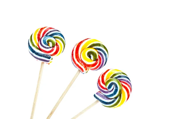 Gruppo di lecca-lecca colorati a spirale isolati su sfondo bianco — Foto Stock