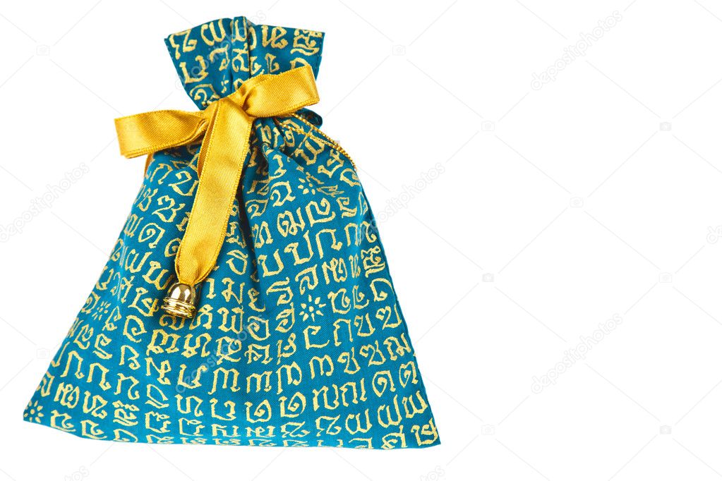 Gift cotton bag on white isolated background.