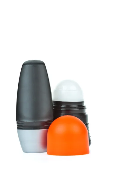 Desodorizante colorido sobre fundo branco — Fotografia de Stock