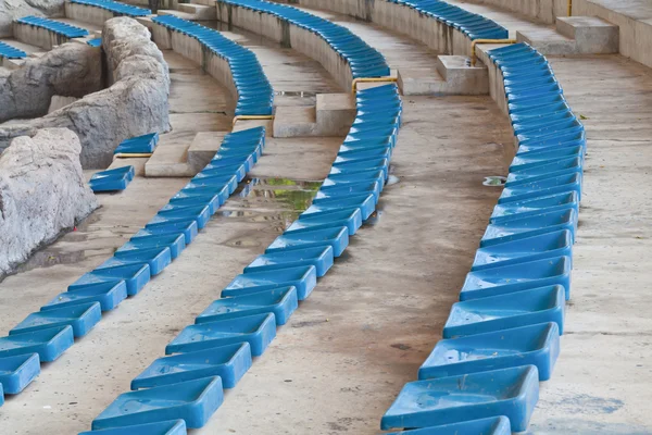 Old plastic blue seats on stadium — Stock Photo, Image