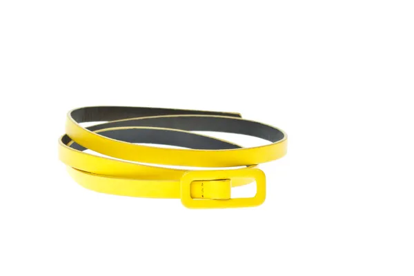 Cinturón amarillo colorido sobre fondo blanco —  Fotos de Stock