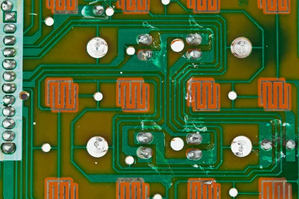 A placa de circuito impresso moderno com componentes eletrônicos macr — Fotografia de Stock