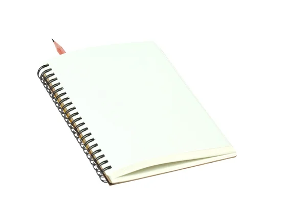 Isolerade ljus grädde färg papper anteckningsbok och penna inuti — Stockfoto