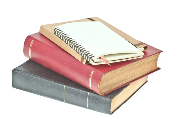 Pencil in, cream colored paper notebook and book as background — Stock Photo, Image