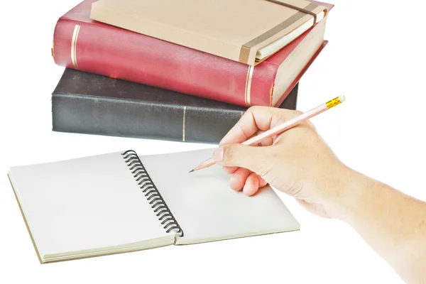 Escritura a mano con lápiz, cuaderno de papel de color crema y bo —  Fotos de Stock