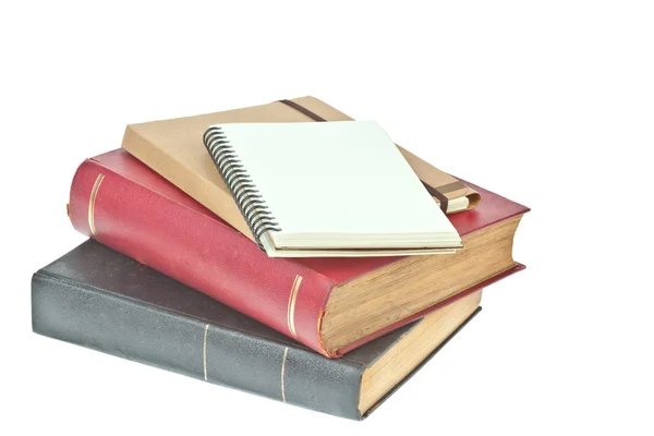 Cream colored paper notebook and book as background — Stock Photo, Image