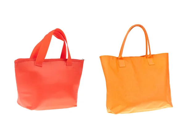Πολύχρωμο πορτοκαλί και κόκκινο βαμβάκι τσάντα σε άσπρο φόντο απομονωμένες. — Φωτογραφία Αρχείου