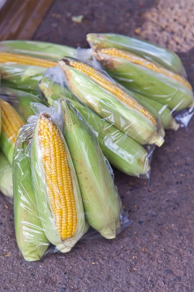 Fruit, corn in plastic bag — Stock Photo, Image