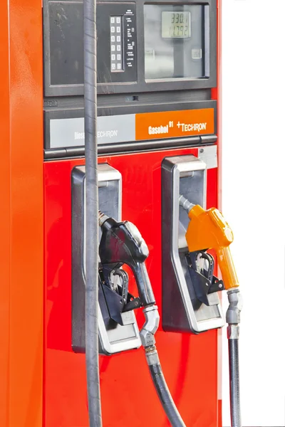 Several gasoline pump nozzles at petrol station — Stock Photo, Image