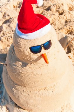 Sand Build Snowman With Sunglasses clipart