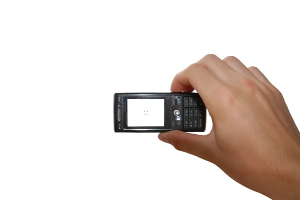Мобильный телефон с рукой на белом — стоковое фото