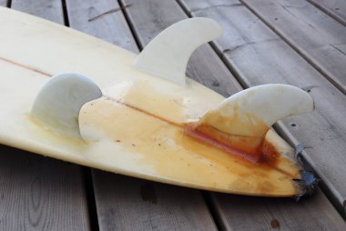 Surfboard After Shark Attack clipart