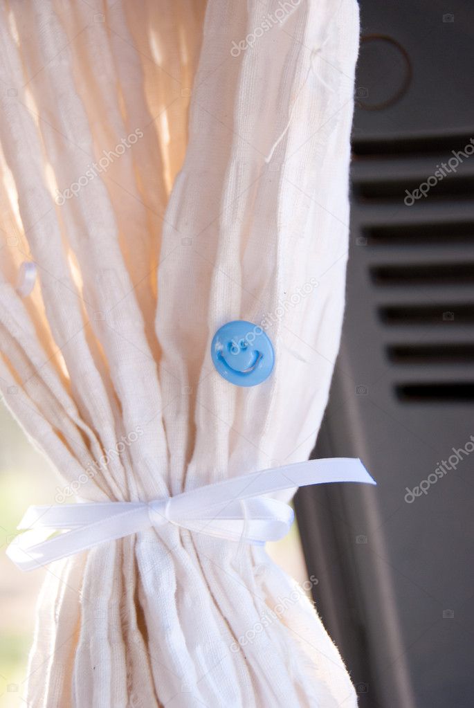 Curtain In Car With Smilie Button
