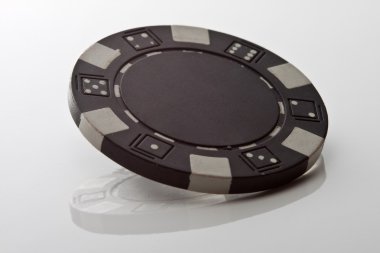 Black chip on white reflection table clipart