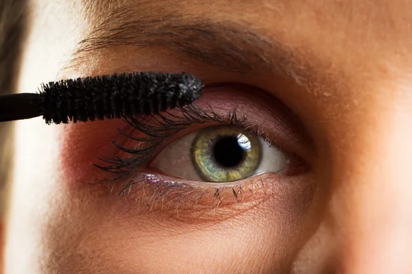 stock image Woman painting eyelashes