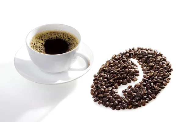 A cup of coffee with seeds and coffee symbol on the white backgr — Stock Photo, Image