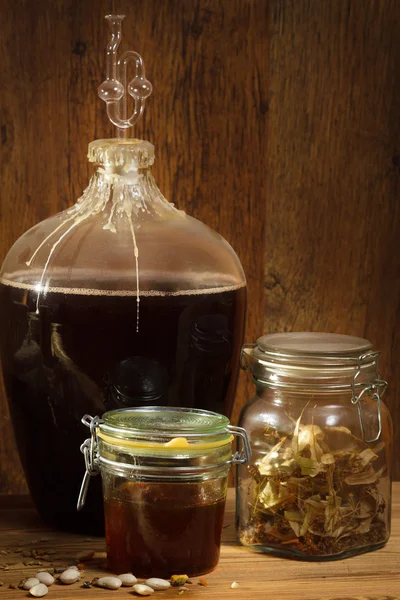 Homemade wine in basement with honey — Stock Photo, Image