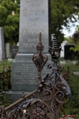 Metal detail on a grave clipart