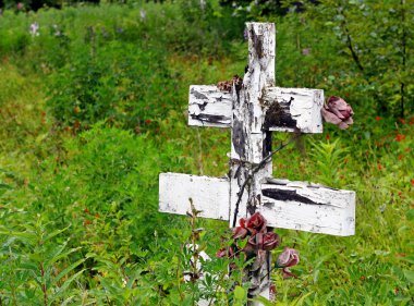 Old wooden cross at a Russian cemetery clipart