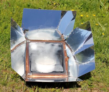 Solar oven in summer clipart