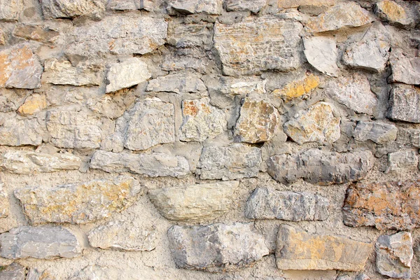 Wall of stones and cement — Stock Photo, Image