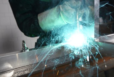 Welder with sparks clipart