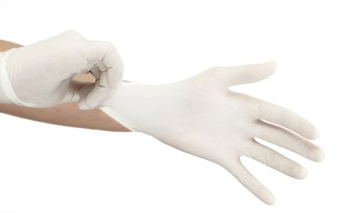 Pulling on surgical glove clipart