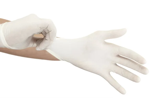 Натянуть хирургическую перчатку — стоковое фото