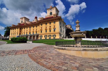 Schloss Esterhazy in the foreground with a stone fountain and forging clipart