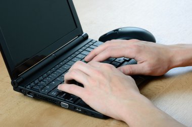 Hands and netbook, mouse clipart